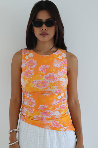 ORANGE FLORAL ASYMMETRICAL TOP